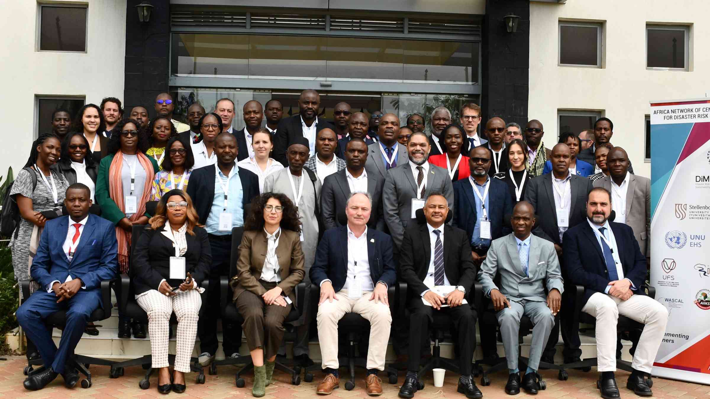 Outside group photo with all participants of the NoE forum