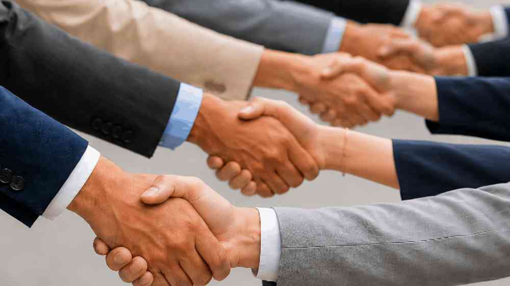 people shaking hands