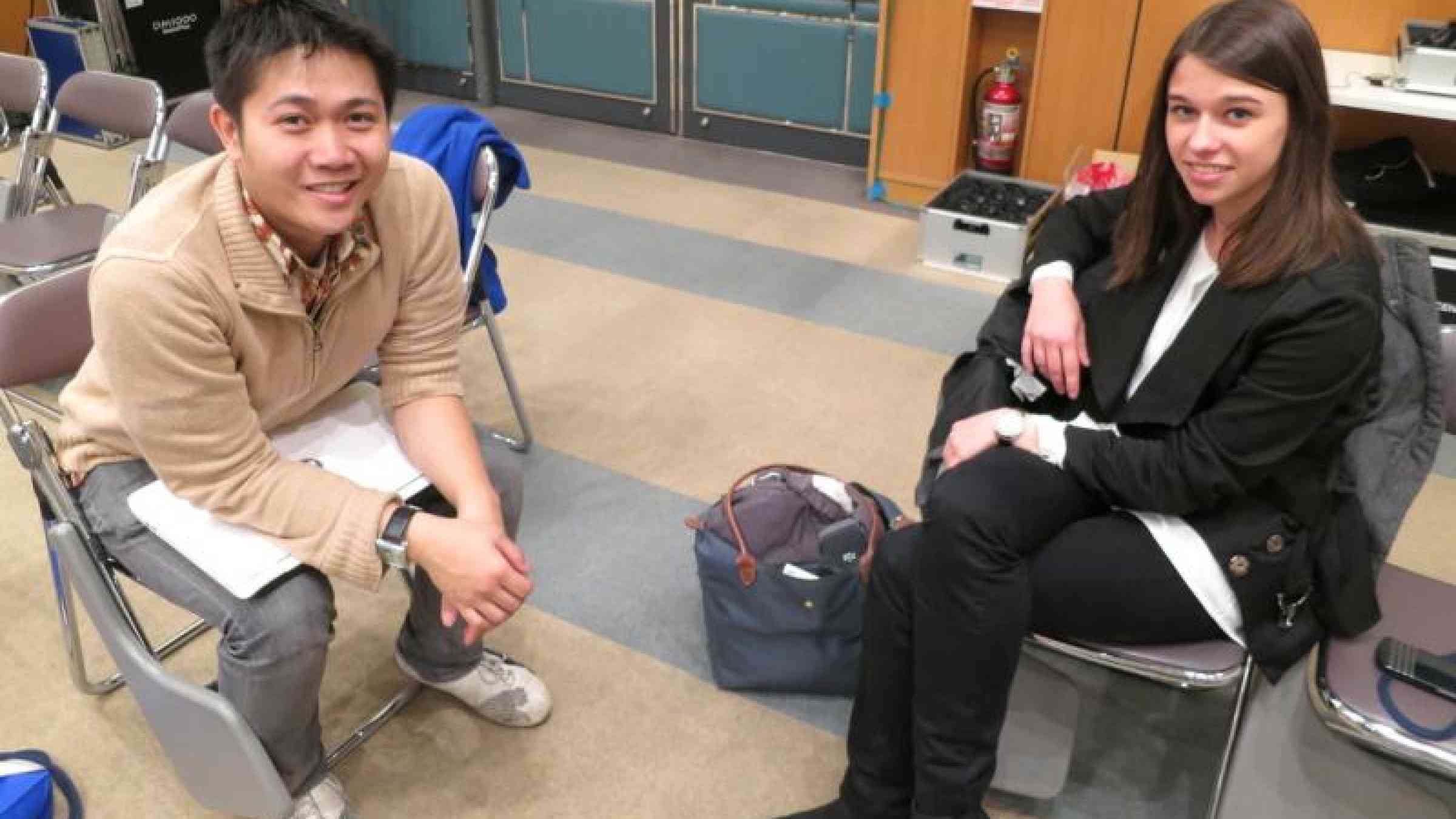 Youth leaders Tam Viet Hoang and Marie-Louise Schwarzenberg ponder a successful World Conference at the end of the Sendai meeting. (Photo: UNISDR)