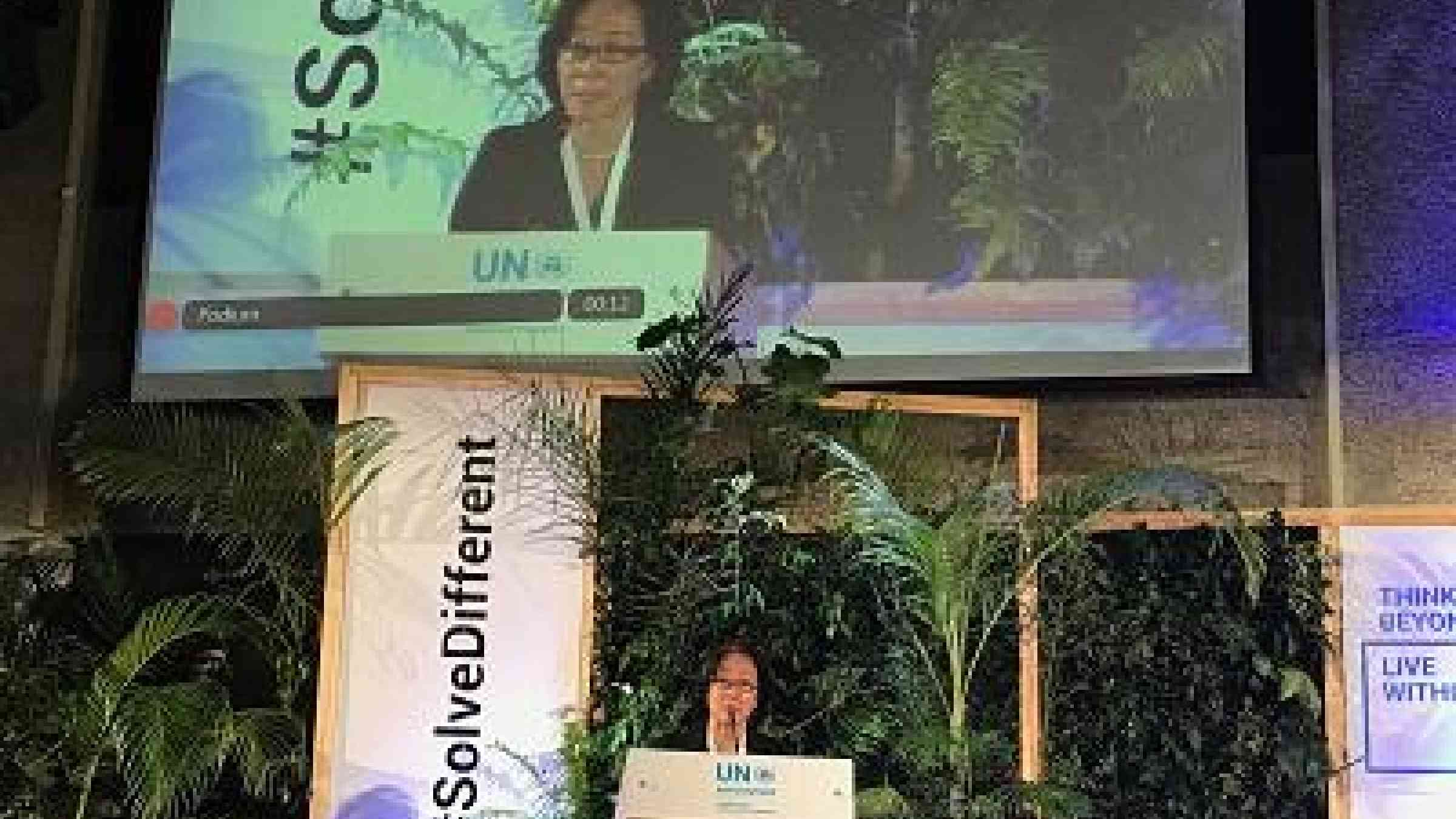 Mami Mitzutori delivering the official statement of the UN Office for Disaster Risk Reduction on the closing day of the UN Environment Assembly